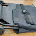 Black aluminium alloy foldable pet stretcher for large dog emergency rescue and transfer.