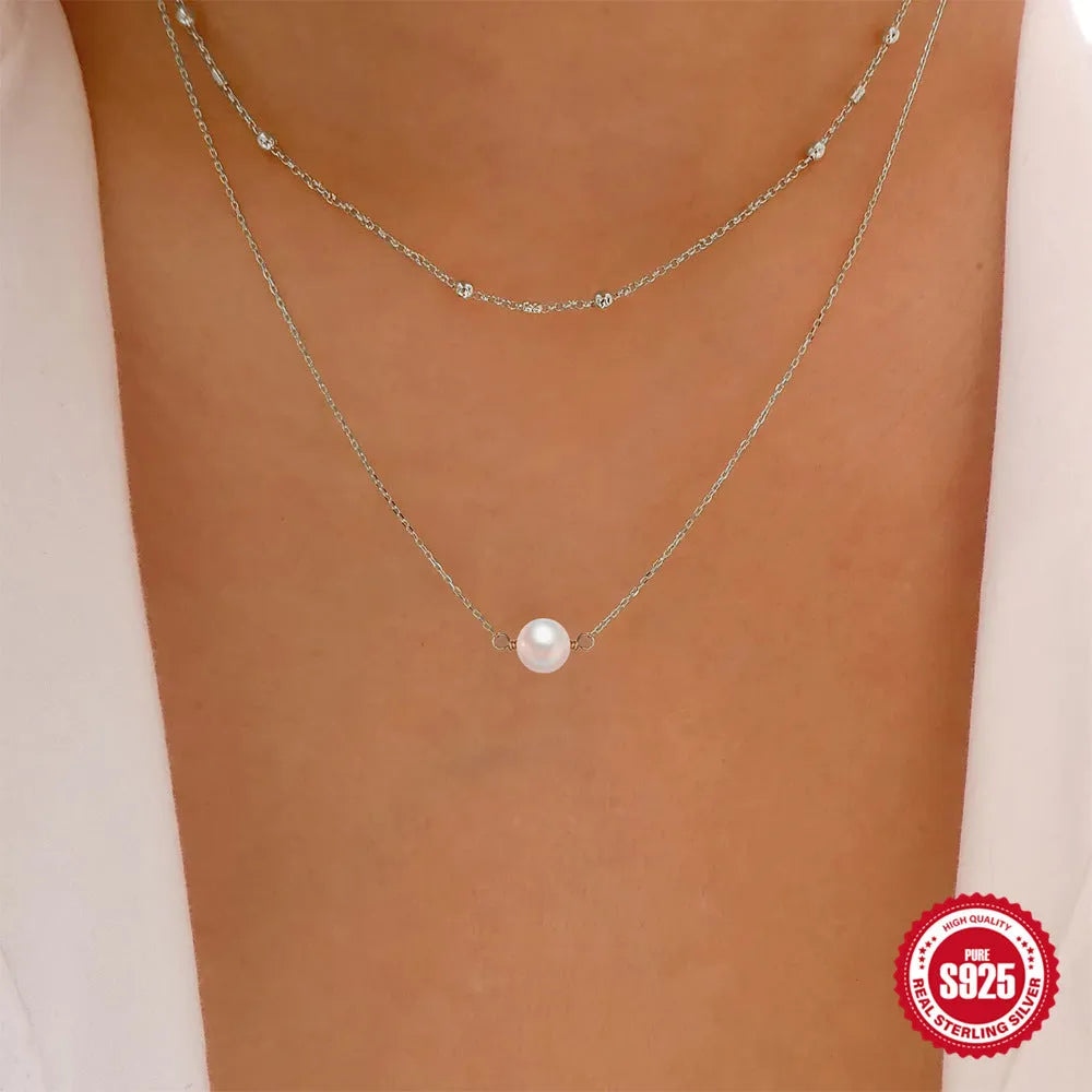 S925 sterling silver double-layer necklace with twin pearls on a ball bead chain.