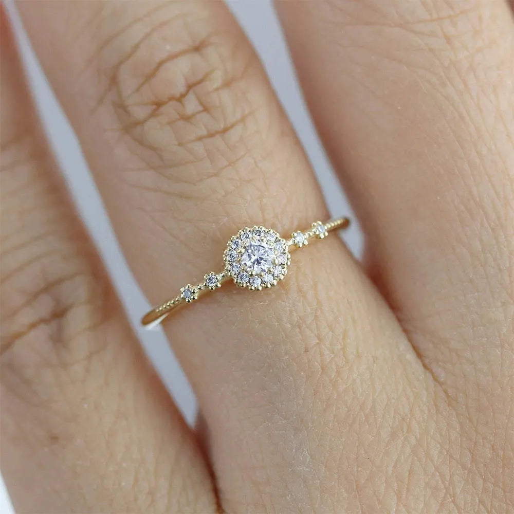 925 silver women's ring with gold electroplated finish, flower rhinestone detailing and geometric shape