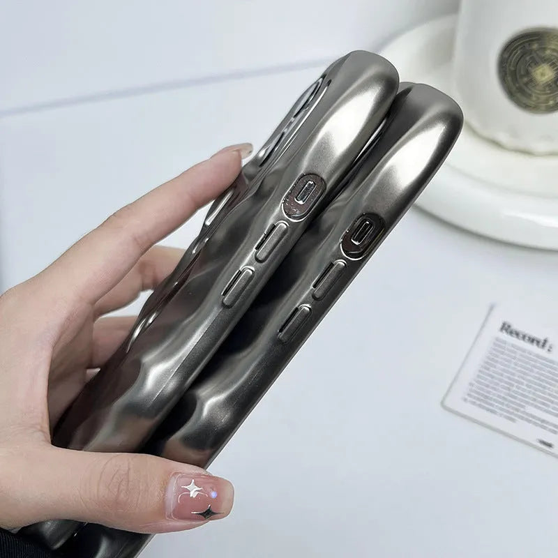 Matte titanium gray TPU phone case with three-dimensional hollow wave pattern and electroplating finish