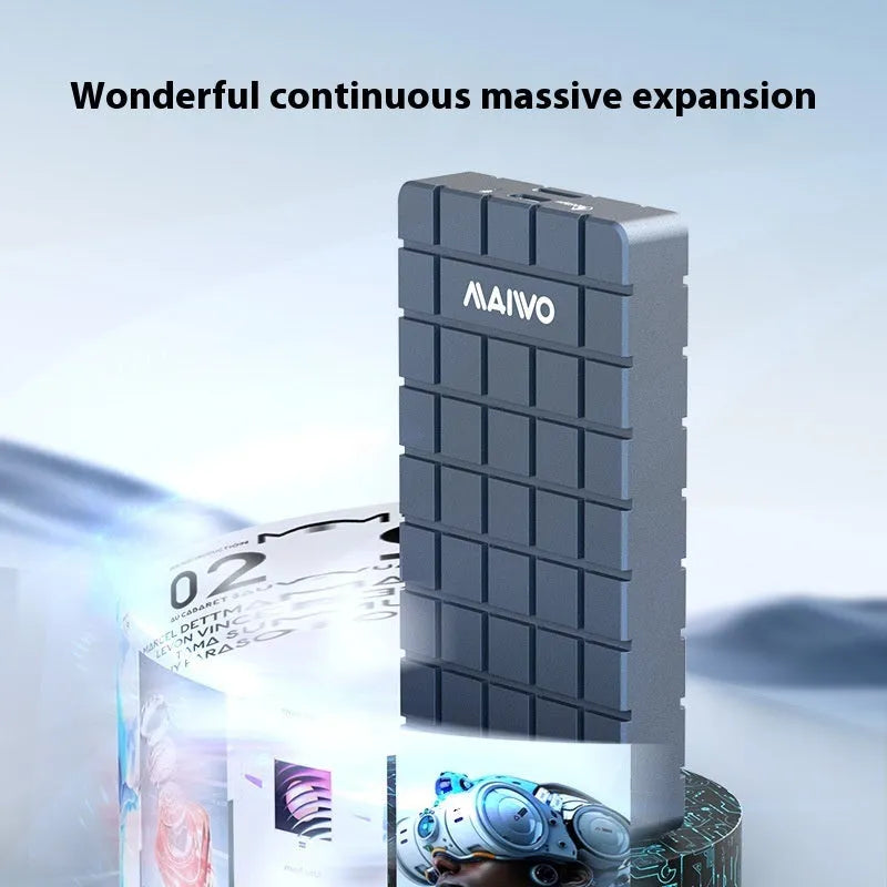 Aluminium USB4 hard disk enclosure for SSD, shown next to a MacBook.