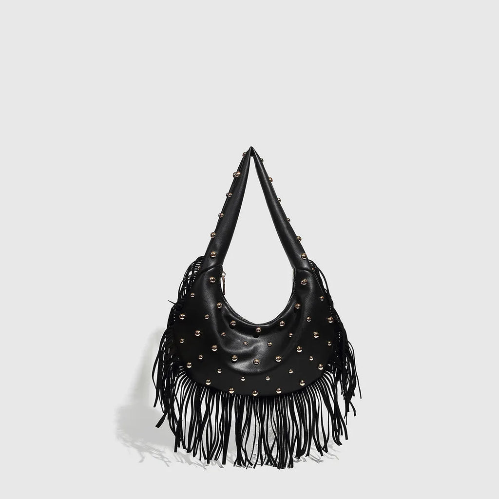 Retro black shoulder handbag with a gold tassel detail and structured shape.