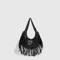 Retro black shoulder handbag with a gold tassel detail and structured shape.