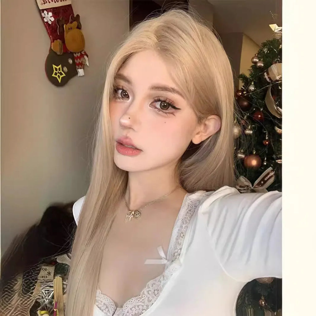 Full hair type women's long straight gray gold wig in milk tea blonde with hairnet on a mannequin