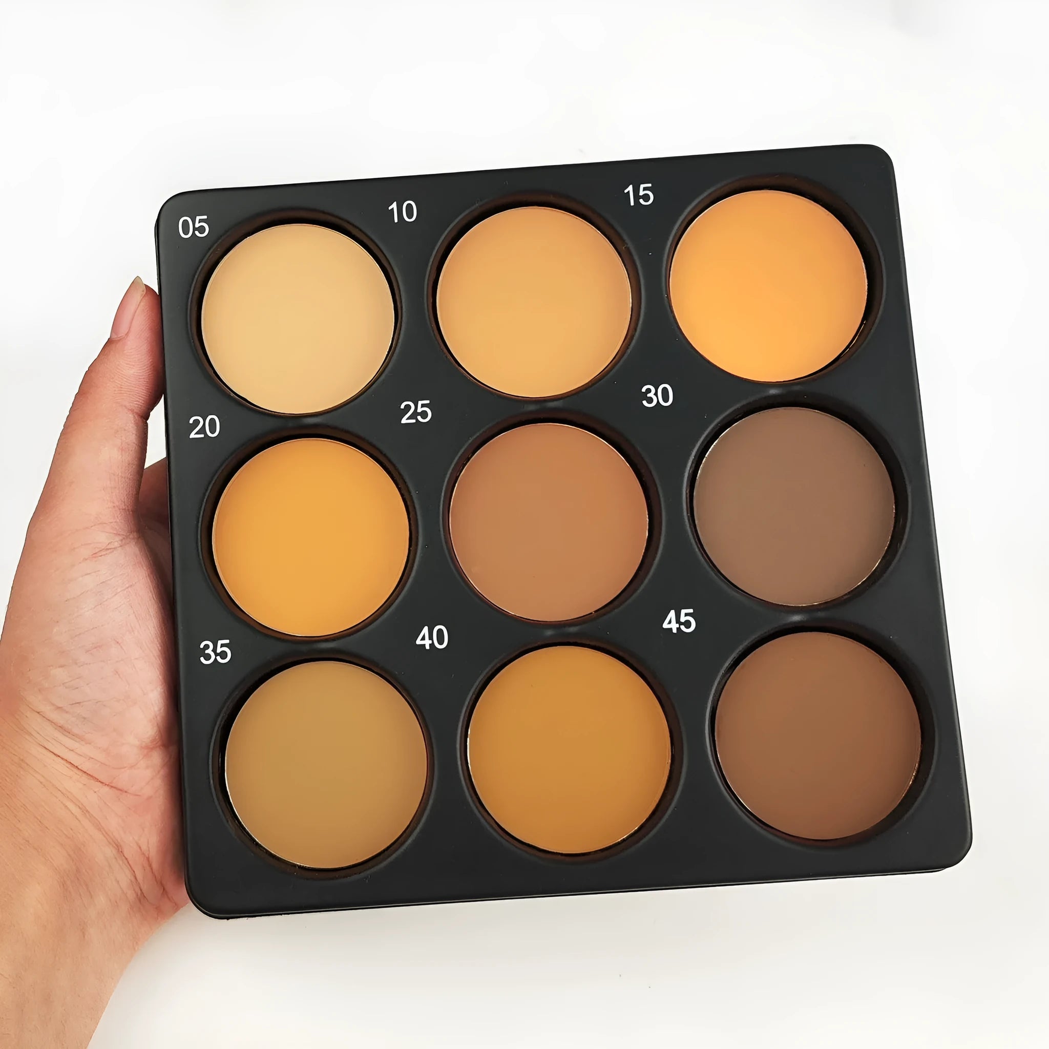 Dark matte makeup palette with nine waterproof colours and repair disk