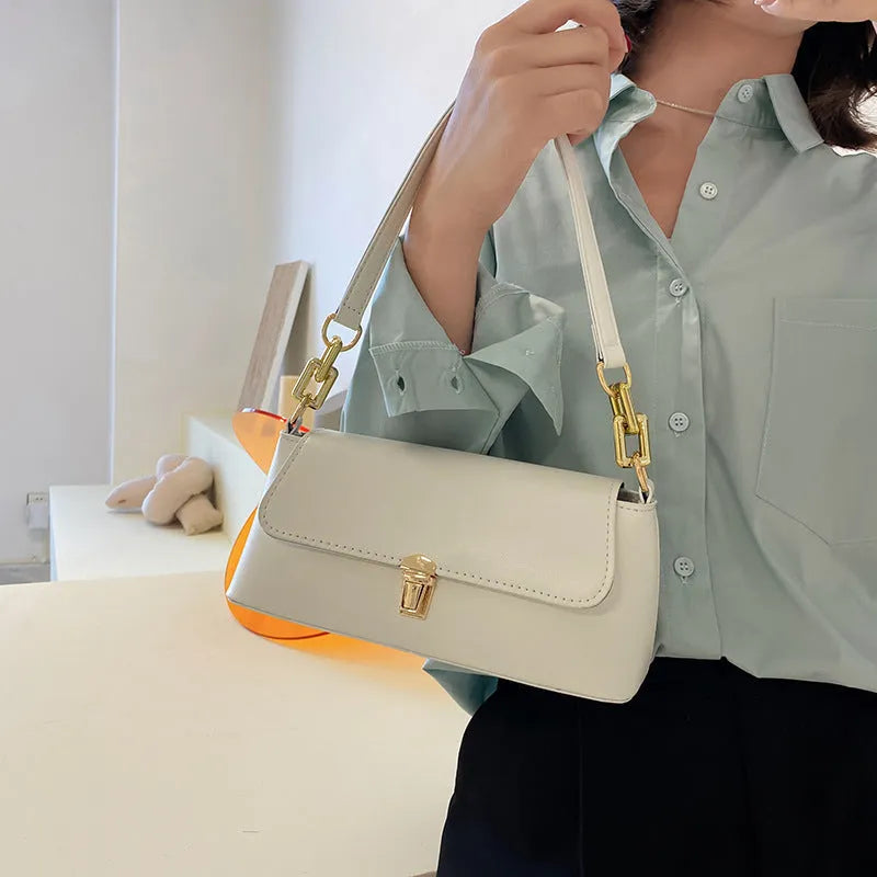 French casual underarm bag with sandwich pocket and shoulder chain in horizontal square shape