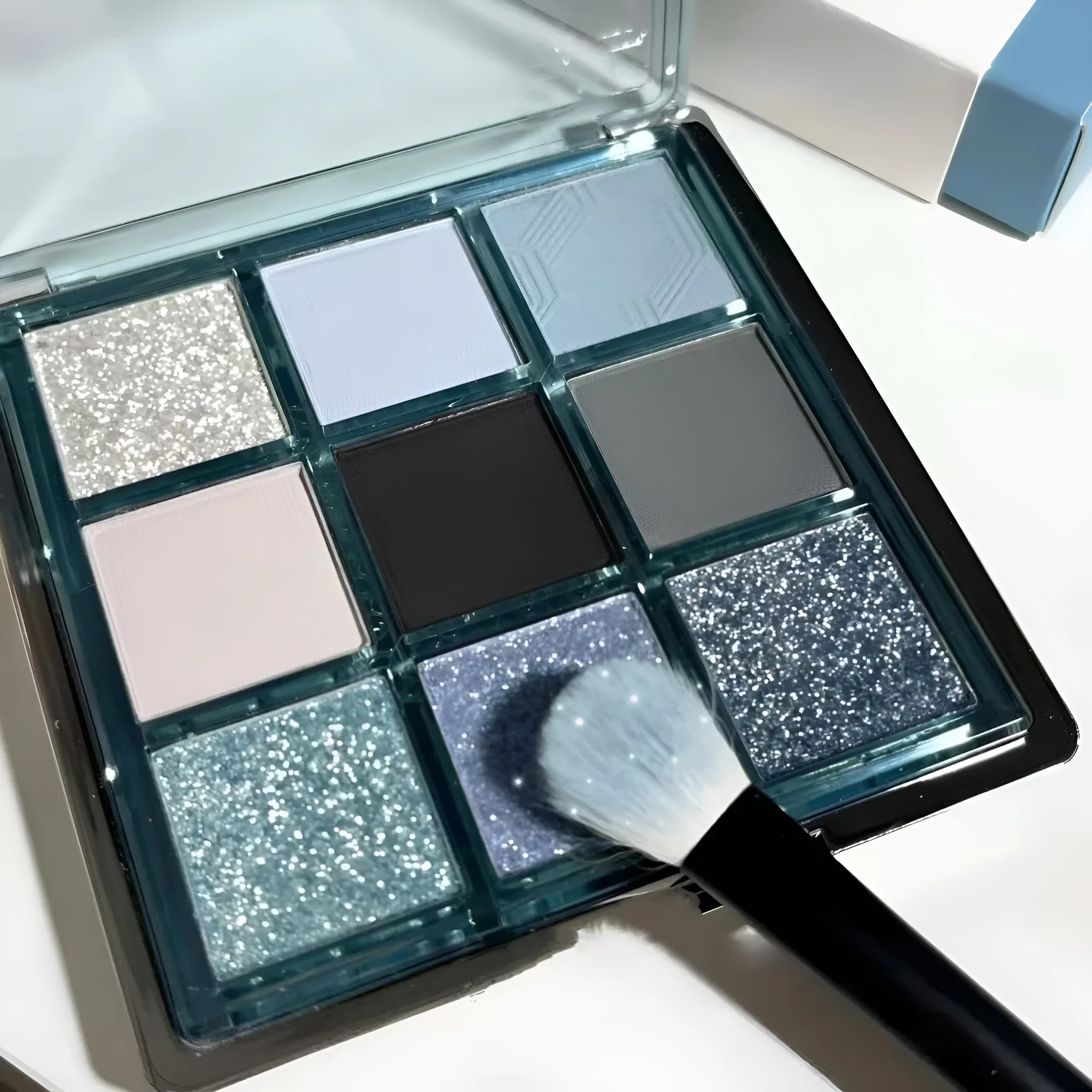 MUGELEEN 08 nine-colour eye shadow palette showing low saturation blues and earth tones