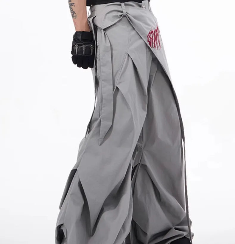 Boy modelling black wide-leg summer pants in a refined Korean style