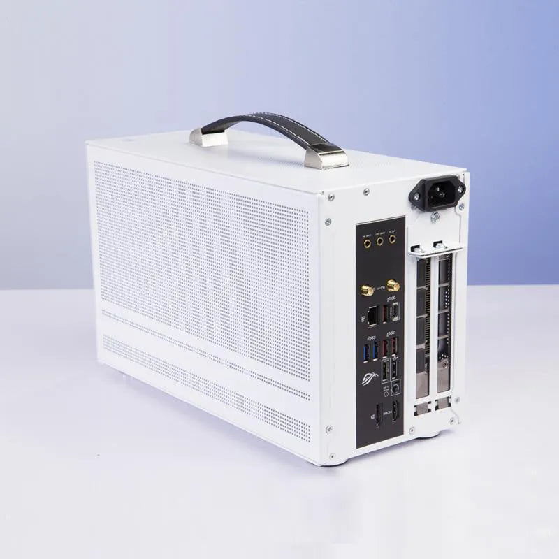 Three Hummingbird Portable mini-ITX desktop computer chassis in titanium grey and white finishes.