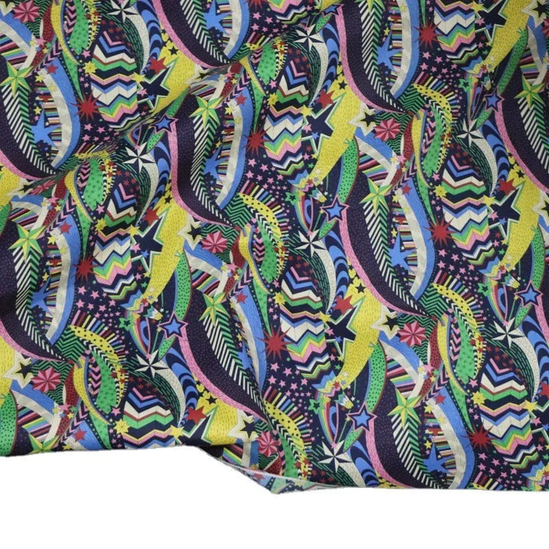 Blue digital print cotton fabric with plant and flower pattern showing 145cm width measurement