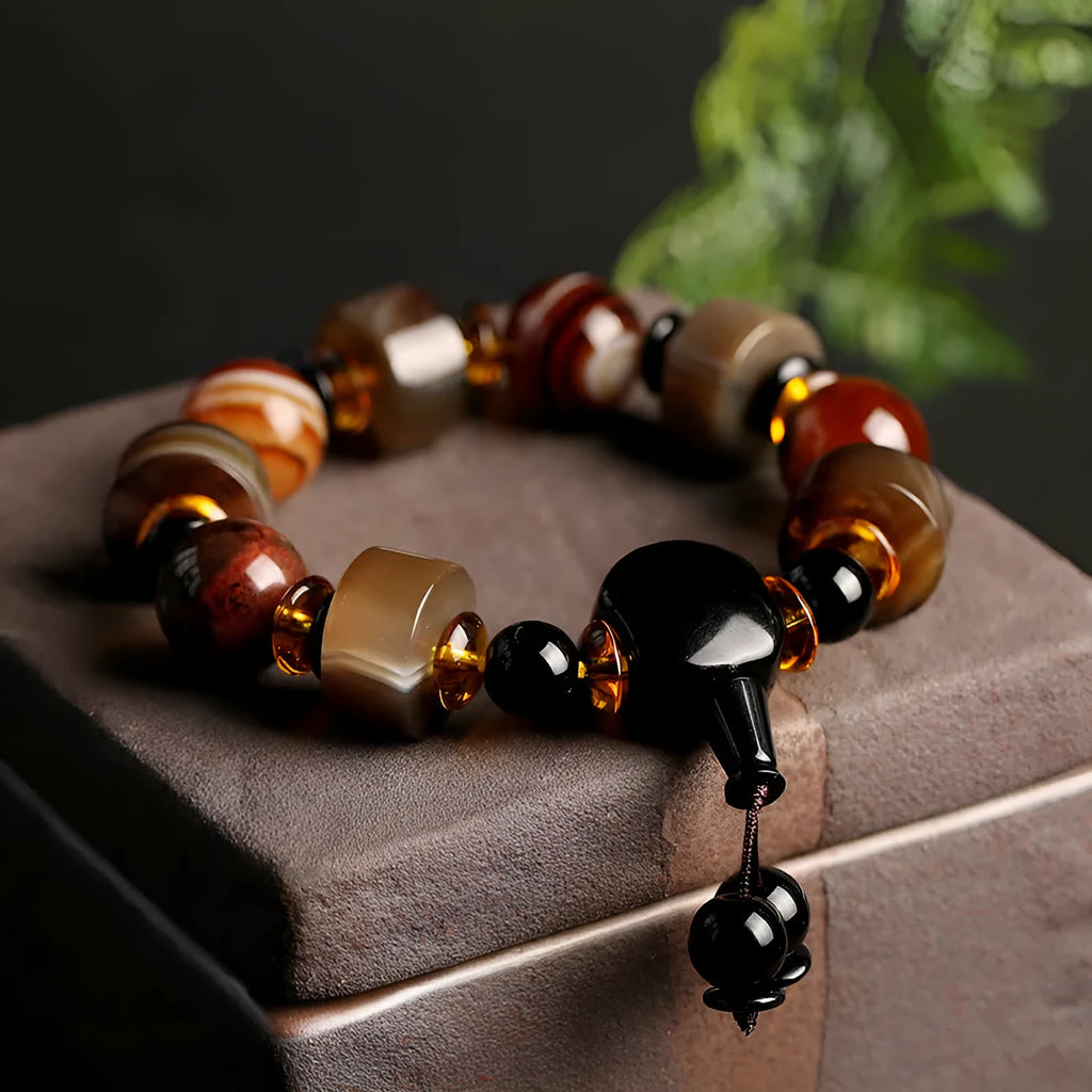 Natural agate bracelet with sardonyx, white, red, and black agate beads in geometric ethnic design