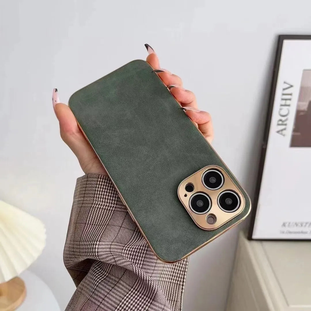 Slim black leather texture phone case fitted on an iPhone 14, showing textured finish and precise camera cutouts.