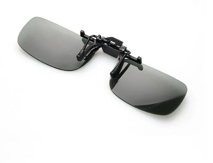 Plastic clip-on sunglasses overlay for prescription glasses, shown in large size with grey tinted lens.