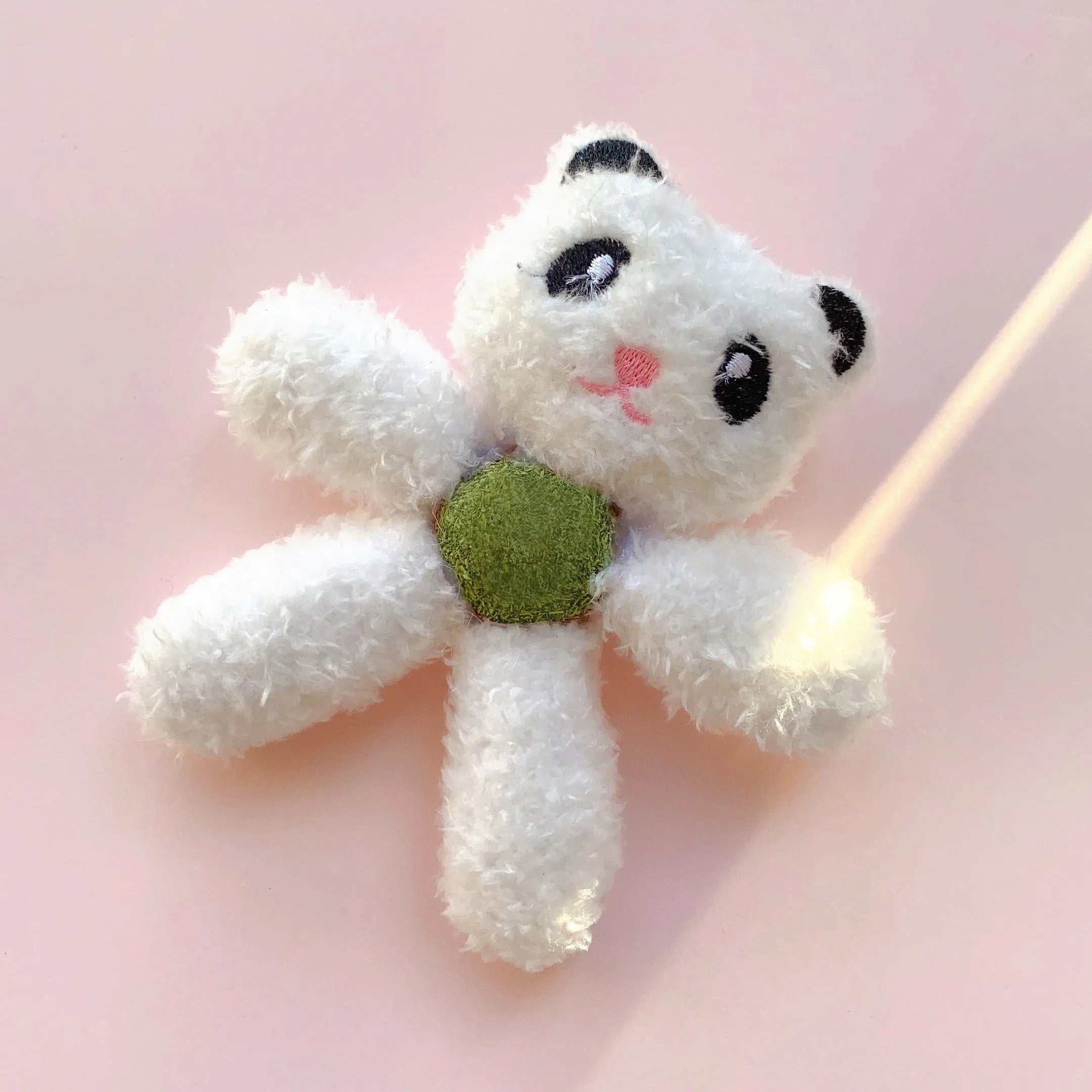 Catnip ball chewing toy in animal designs for feline dental play and entertainment