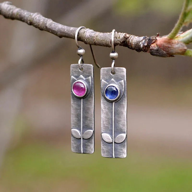 Geometric ellipse earrings with antique red sapphire finish and electroplated metal construction