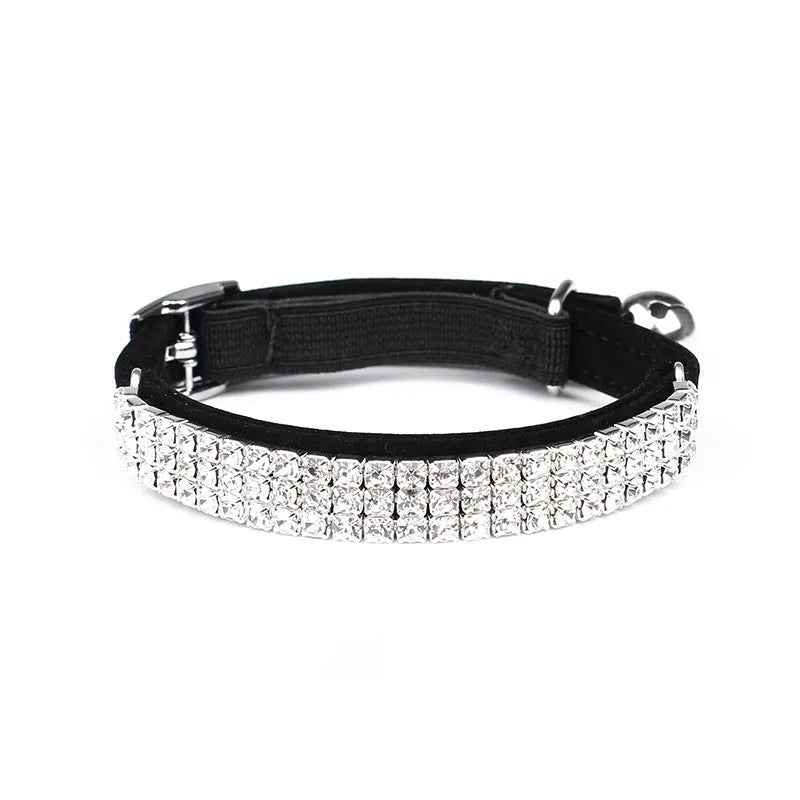 Red velvet suede cat collar with a central silver rhinestone, showing adjustable buckle on a 1cm wide band.