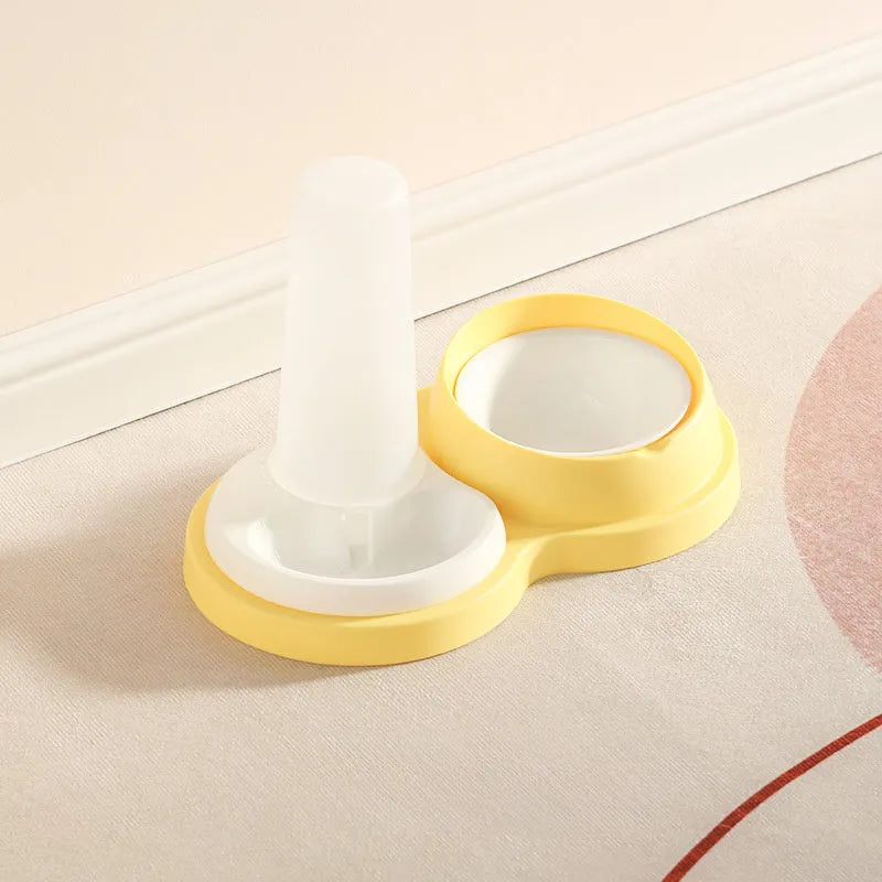 Grey and yellow dual-bowl pet feeder with raised neck collar and non-slip base