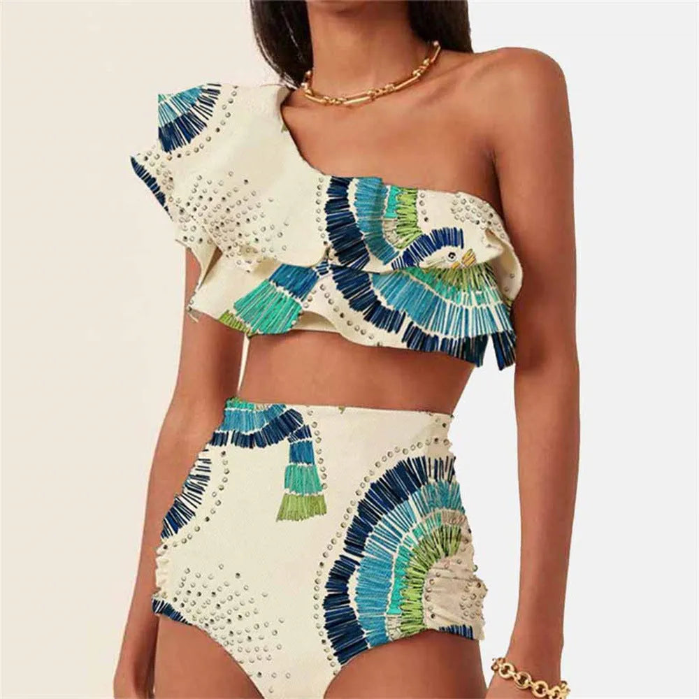 White one-shoulder women's swimsuit with a large layered lotus leaf skirt and split-leg design.