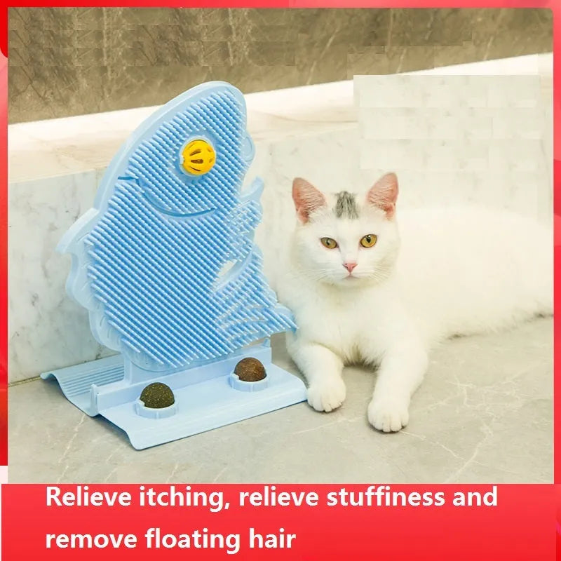 Blue fish-shaped plastic cat wall scratcher with self-grooming brush, catnip balls and mini bell