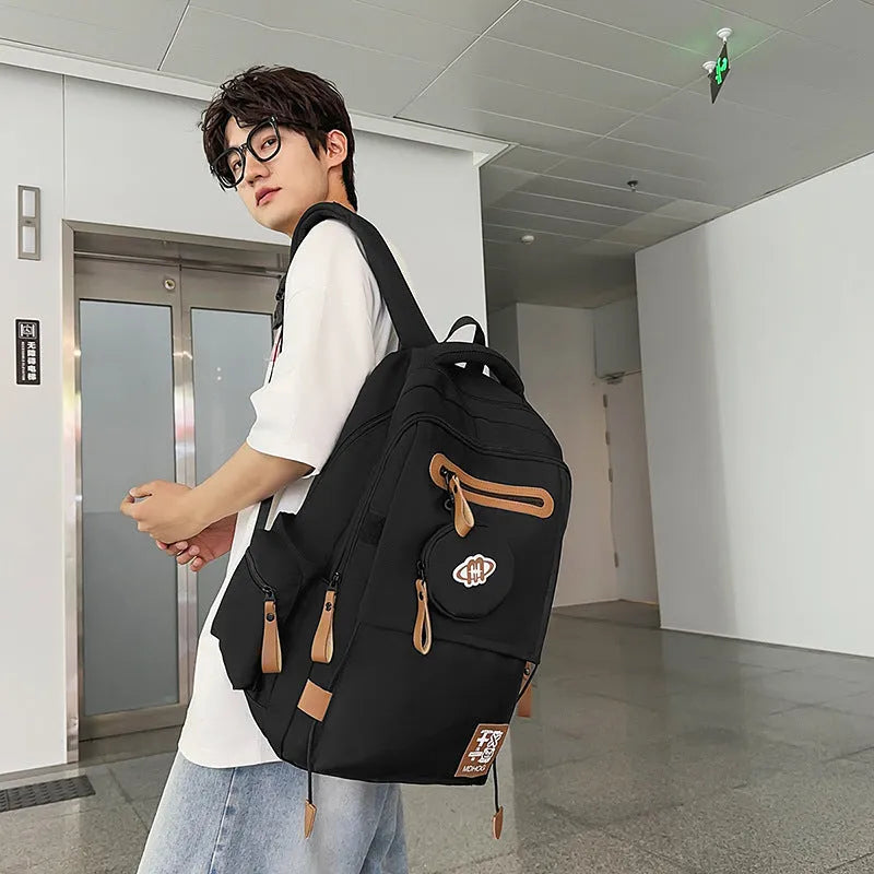 Waterproof nylon travel backpack with contrast stitching in five colour options