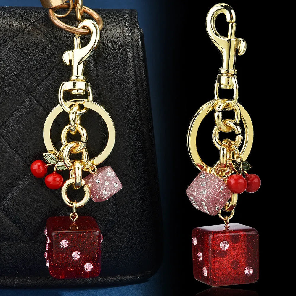 Vintage cherry red two-tone metal dice bag keychain pendant with a square geometric shape