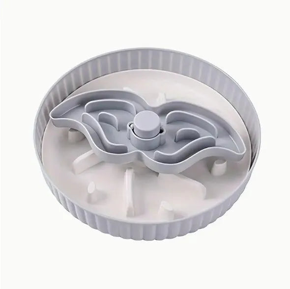 Colourful rotating pet slow feeder bowl with a silicone licking mat in a windmill design.