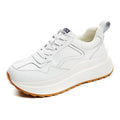 Women's white cowhide leather casual sports shoes with round toe, cross strap, and English muffin heel