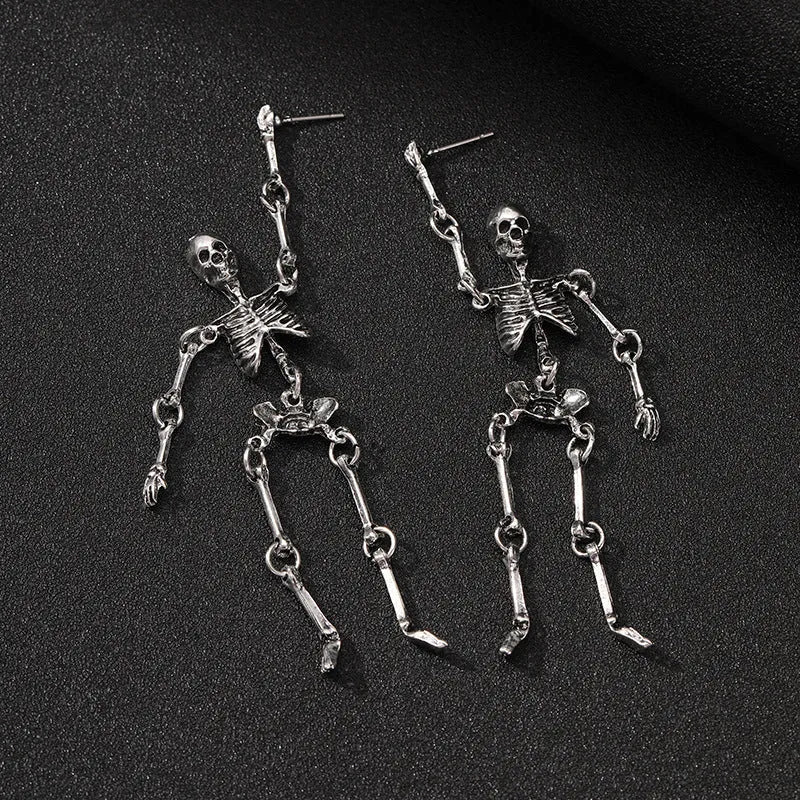 Exaggerated skull frame earrings in antique silver, zinc alloy electroplated finish, unisex design with hook fastening on white background