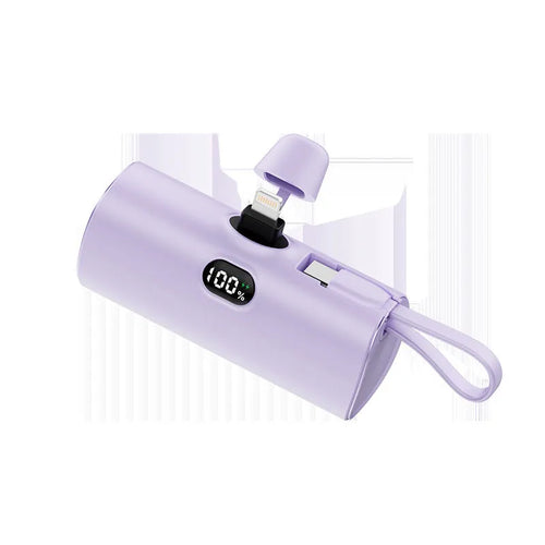 Capsule shaped digital display wireless power bank in multiple colours showing its compact size and built-in plug.