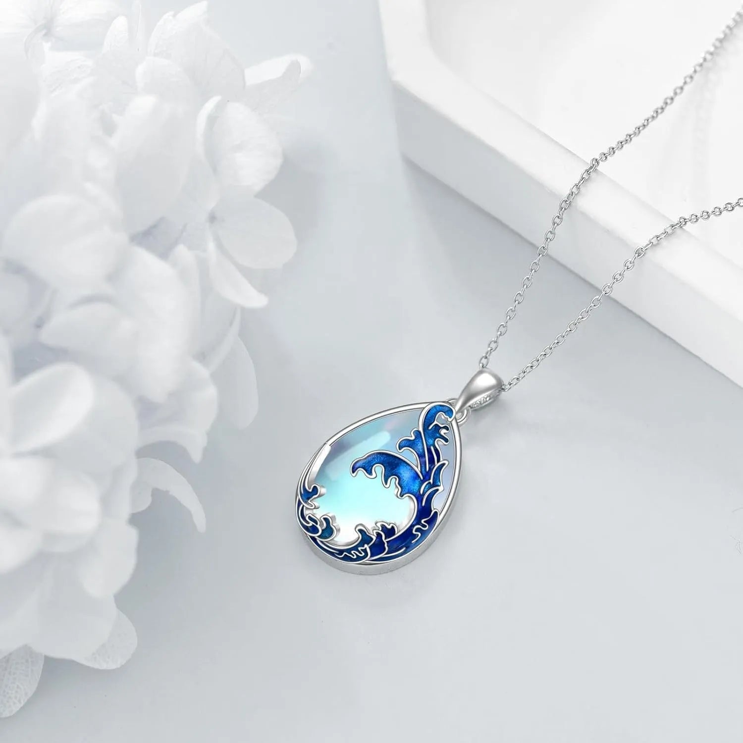 Blue heart-shaped alloy pendant on an adjustable chain necklace for women.
