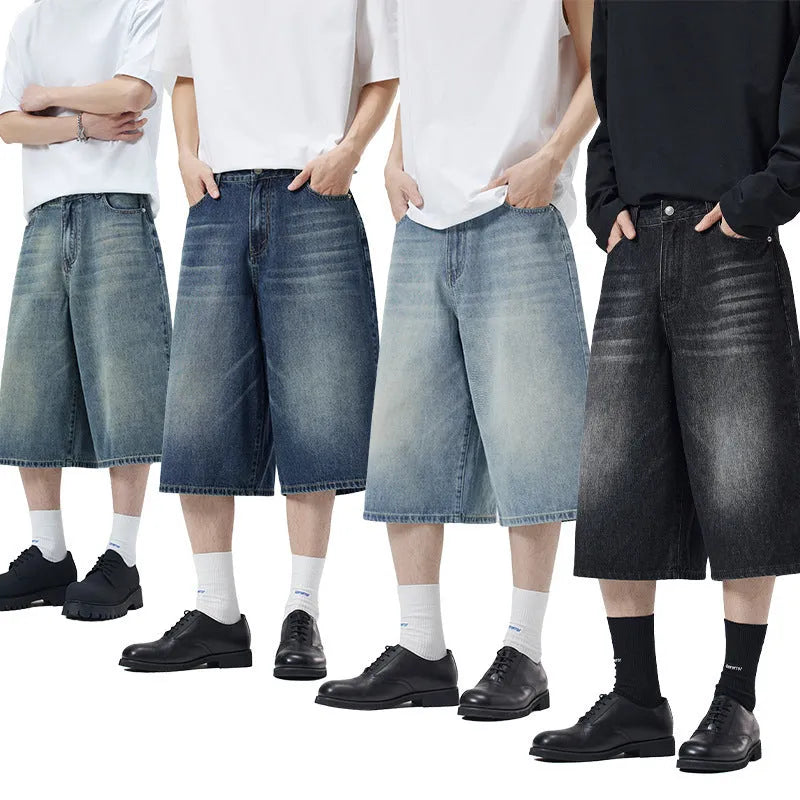 A pair of light blue denim shorts with a loose straight leg and cropped length on a neutral background.