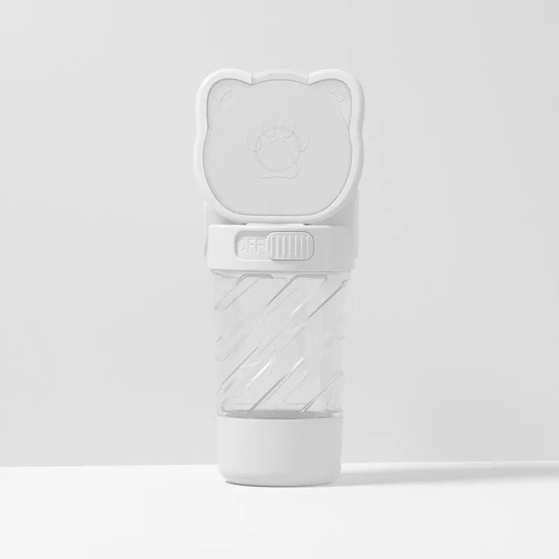 Green, pink, or white 3-in-1 portable pet water bottle with food container and garbage bag dispenser attached to a strap.