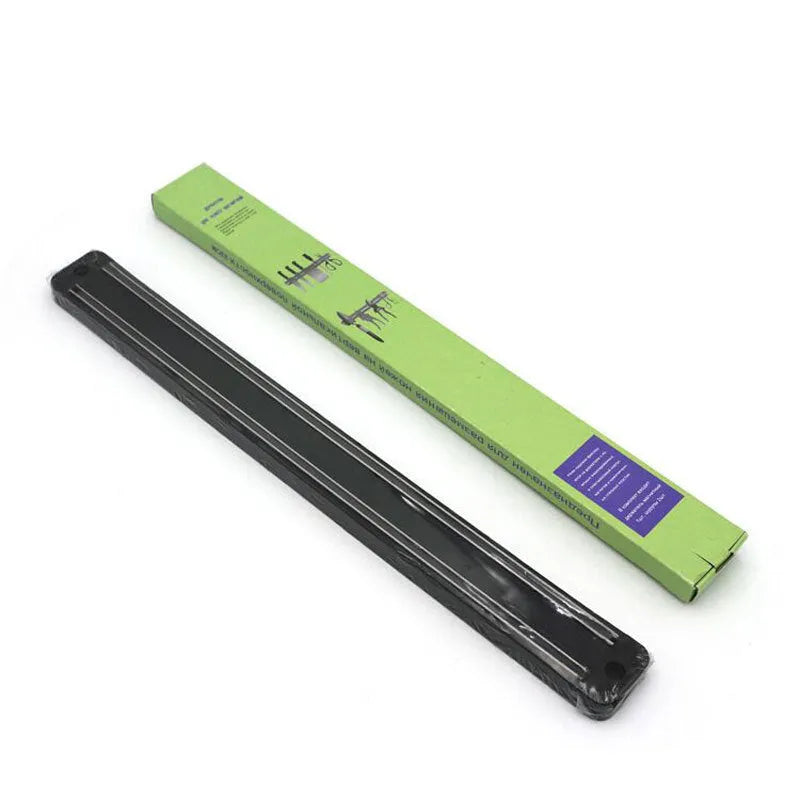 50cm magnetic knife holder with stainless steel strip and plastic body on a wall