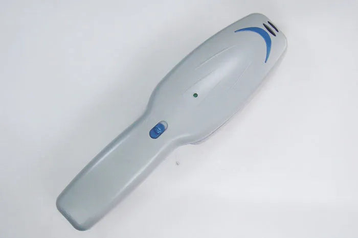 White pet ion comb with removable brush head and 78 comb teeth on a blue background.