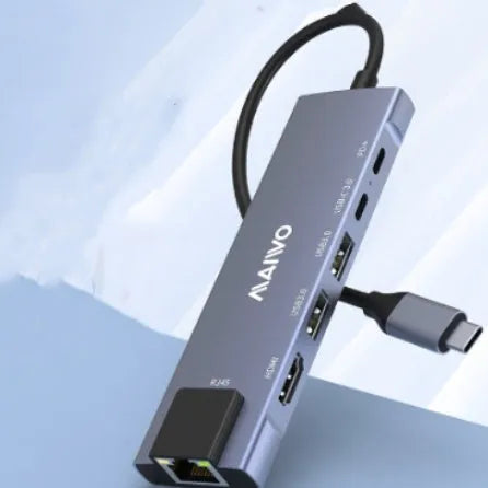 Aluminium six-in-one Steam Deck docking station showing USB, HDMI, and Ethernet ports.