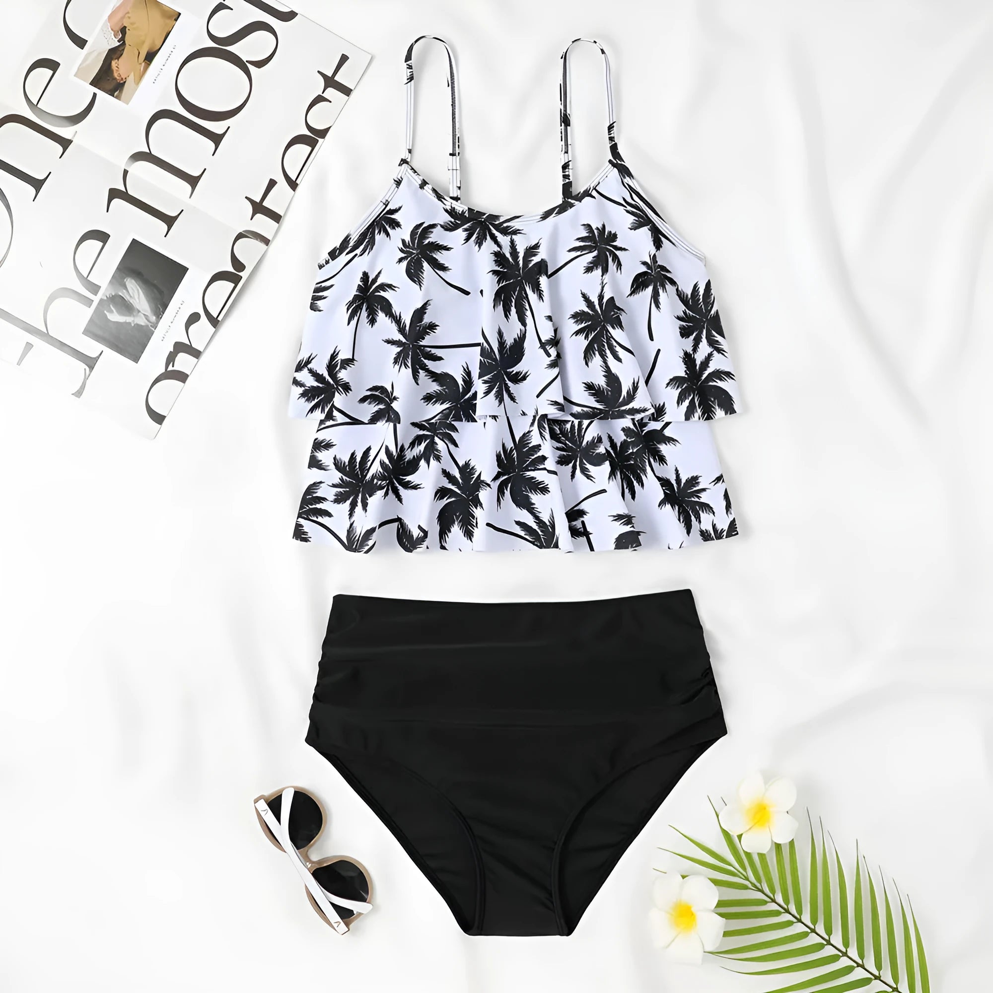 High waisted black and coconut tree print swimsuit top and bottom on a mannequin