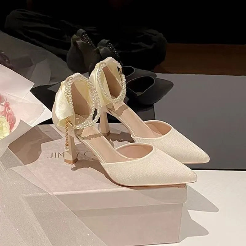 Women's fairy bow high heels in apricot with 6cm wine glass heel, side view