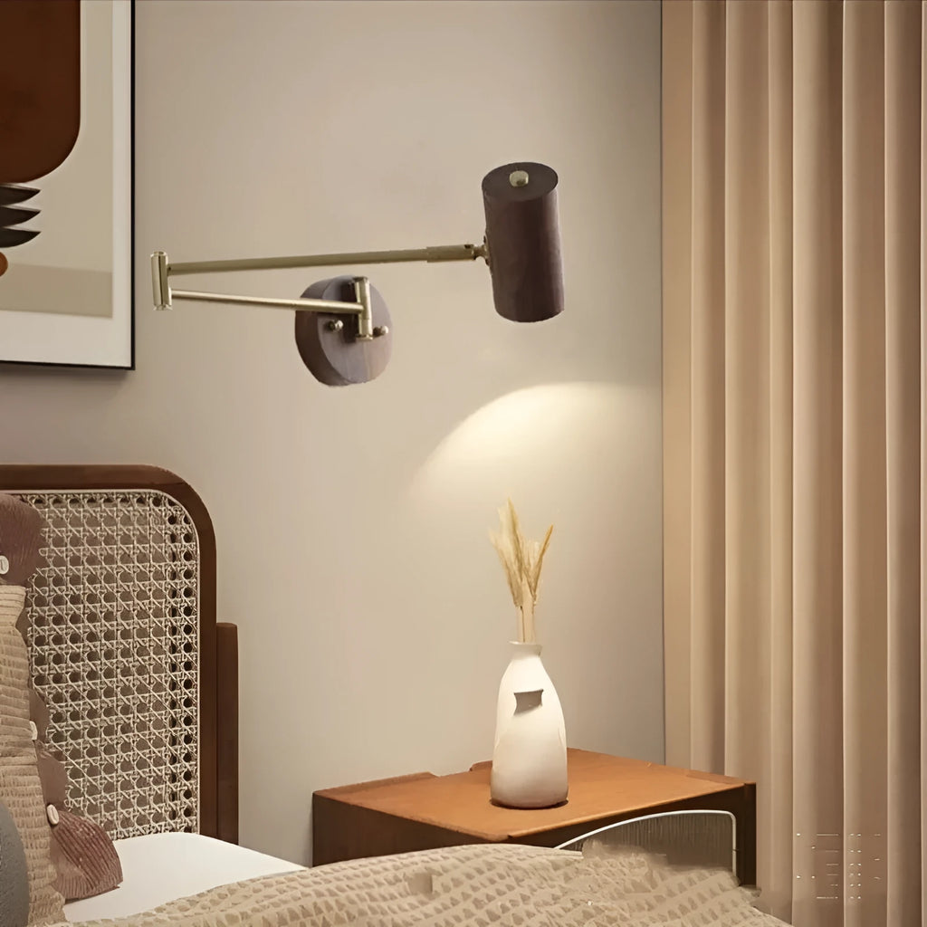 Retro-style long-arm wall spotlight with rotating head in walnut finish and a ribbon pull switch.