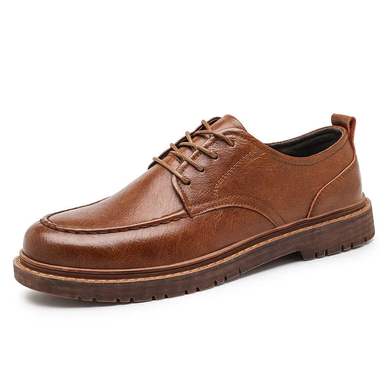 Men's black and brown British-style casual leather shoes with round toe and flat rubber sole.