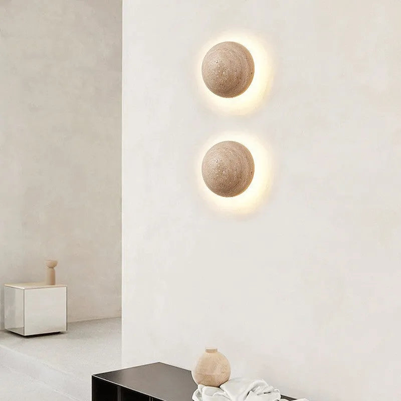 Yellow semicircle cave stone wall lamp with wooden base, shown as a bedside or stair light.