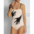 Women's one-piece bikini swimsuit with gauze skirt detail in polyester fabric