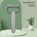 Green and grey dog unknotting combs in large and small sizes with stainless steel teeth.