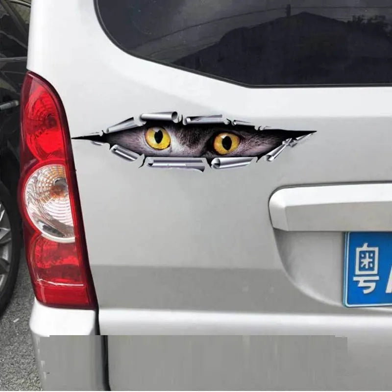 3D Tiger Eye or Eagle Eye pattern car door sticker on a vehicle bumper.