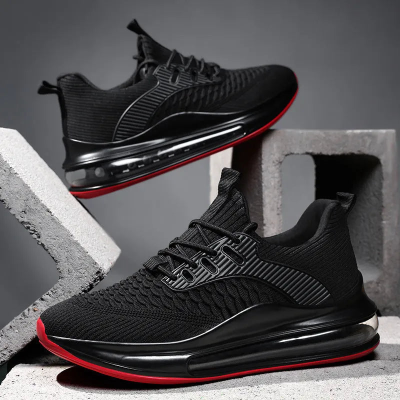 Men's black low-top mesh running shoes with a round toe and lace-up front on a white background.