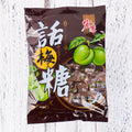 Assortment of Chinese fruit hard candies: plum sugar, guava and tangerine peel flavours in separate packets.