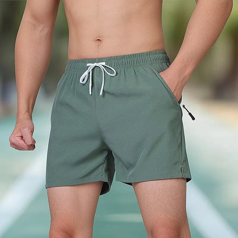 Men's black fitness training shorts with high waist design and drawstring closure