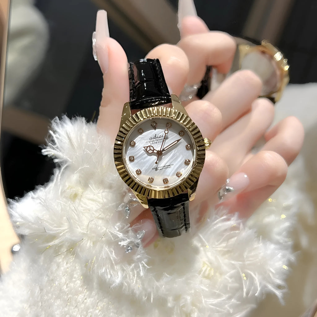 Women's rose shell watch with 7mm thin case, shown with white, red, or black leather strap or steel belt