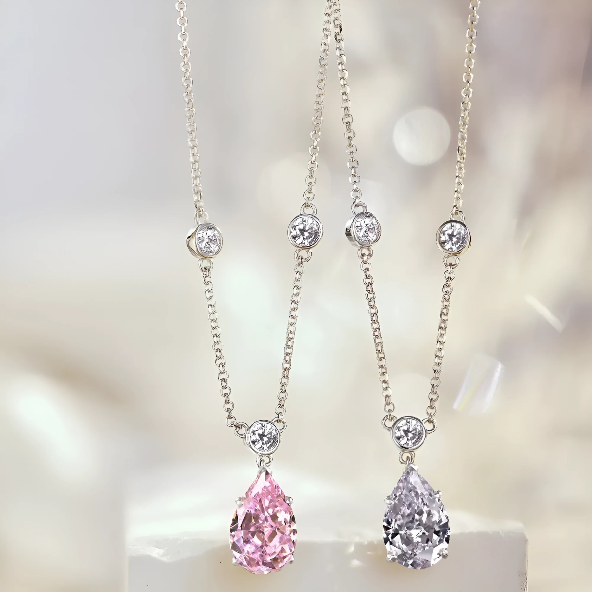 925 silver electroplated drop-shaped necklace in platinum white diamond finish on display