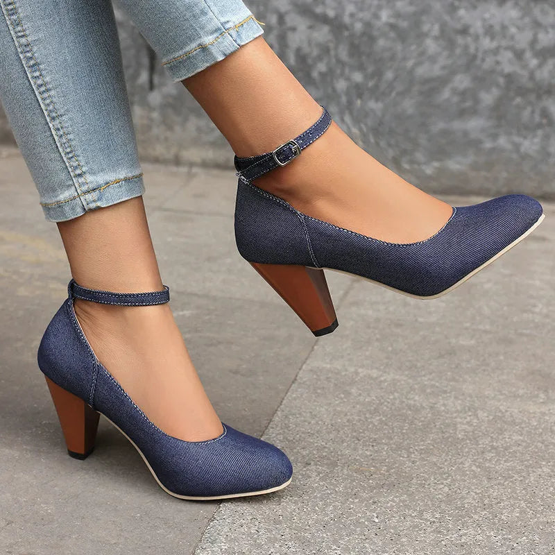 Women's blue denim platform heel boots with buckle fastening and waterproof construction