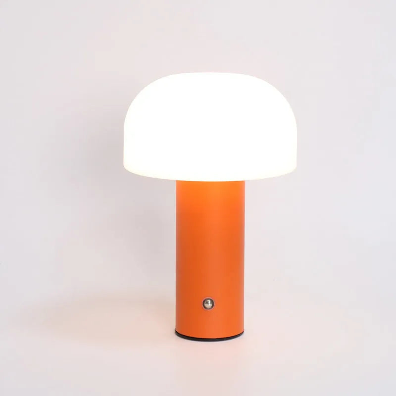 USB-powered decorative atmosphere table lamp in black, green, orange, or white plastic.